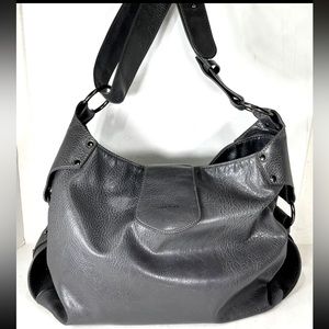 This is for a large gray vegan faux leather shoulder bag, by Matt and Nat!